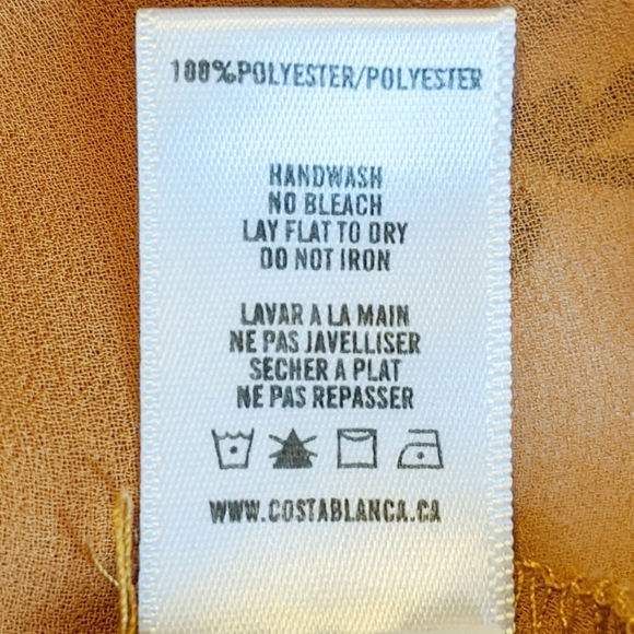 COLLECTION COSTA BLANCA Sheer Asymmetrical Bow Top - Picture 7 of 9